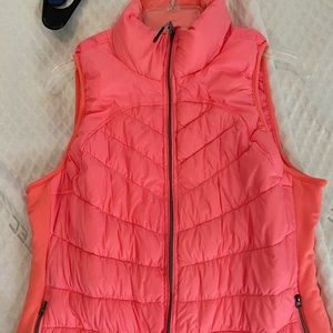 Women’s tangerine puffer vest size large